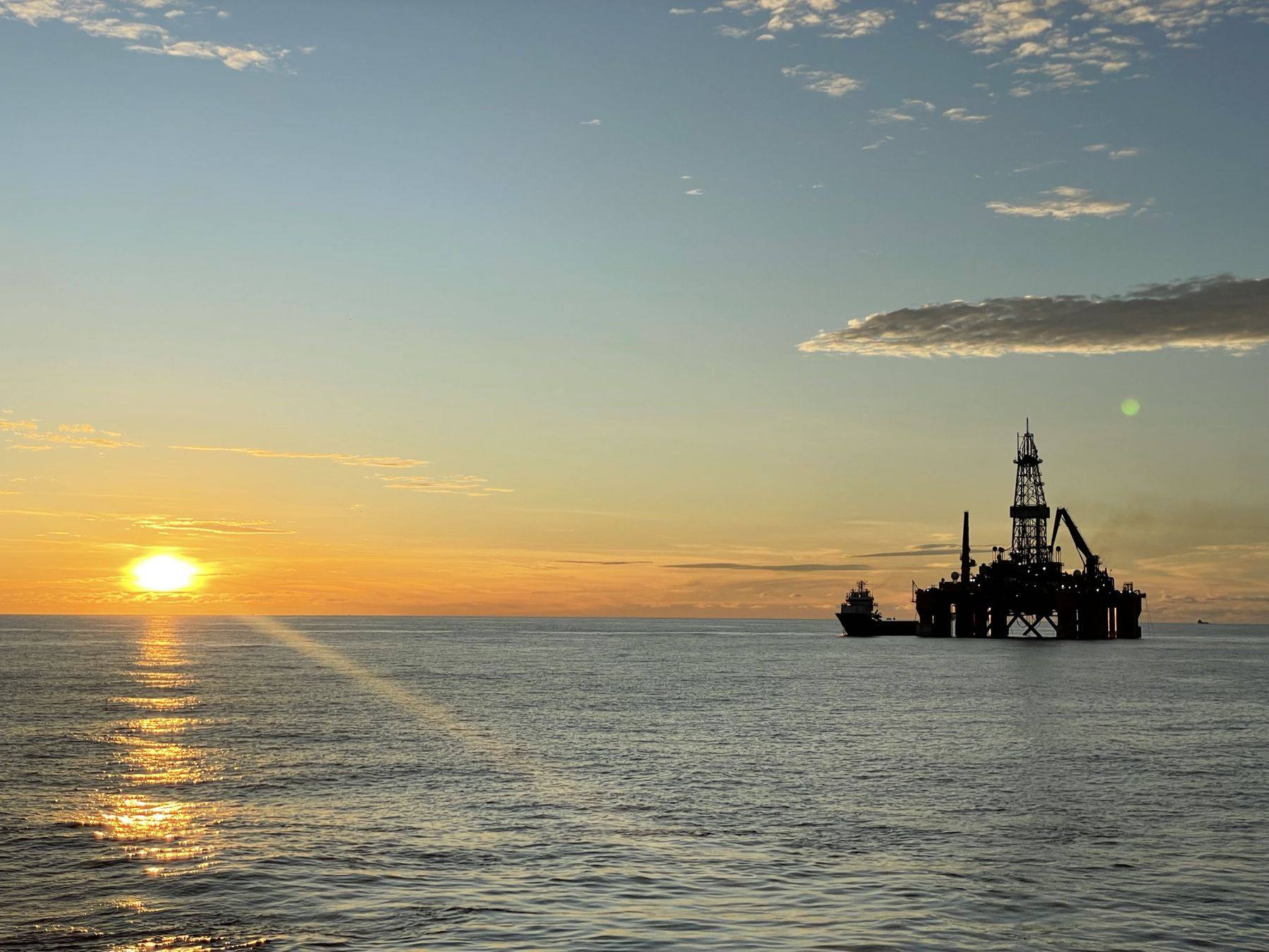 Offshore rig at sunset